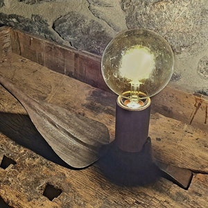 Table lamp with antique hoe