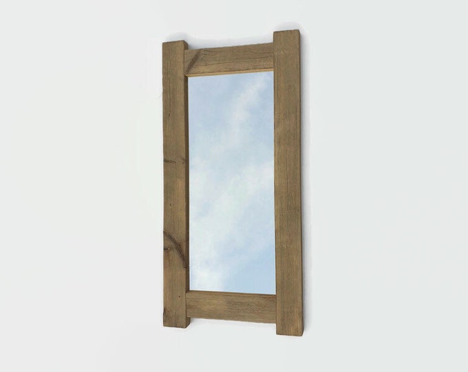 wall mirror framed in recycled wood