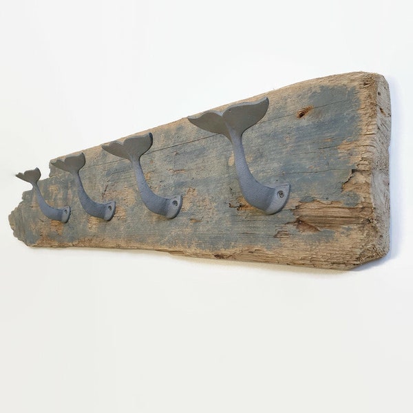 coat hanger made with a board recovered from the sea