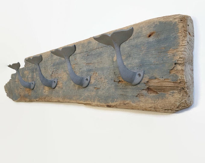 coat hanger made with a board recovered from the sea