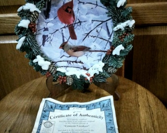 Beautiful vintage Cardinal plate set in wreath botder