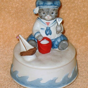 Rare vintage kitty cucumber Sailor playing in sand