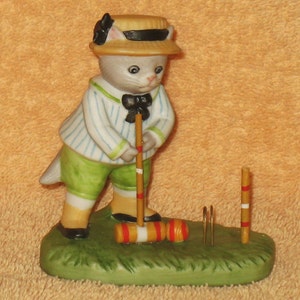 Kitty cucumber Albert playing croquet mnb