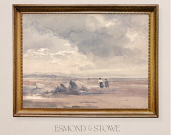 May include: A framed watercolor painting depicting a seascape with two figures walking on a sandy beach. The sky is cloudy and the water is calm. The painting is in a gold frame with a decorative border.