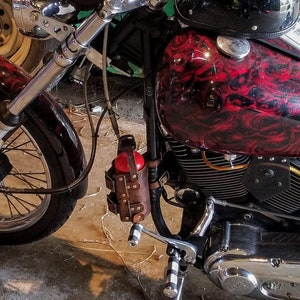Portador de cuero para combustible de reserva