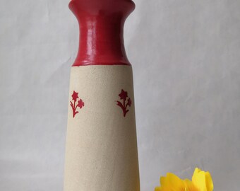 Ceramic wheelthrown vase/bottle with red flowers. 22cm tall.