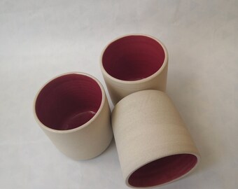 Handmade wheelthrown ceramic tea, coffee cup with red interior