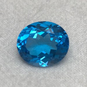 Swiss Blue Topaz 14x12mm Oval Cut Loose Topaz 10 ct Gemstones Bright Blue Topaz Faceted Very Blue Topaz Unmounted December Birthstone