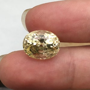 GIA Certified 10.14 Carat Unheated Yellow Sapphire 12.71x9.99mm Oval Cut, Faceted Loose Natural Sri Lanka Sapphire