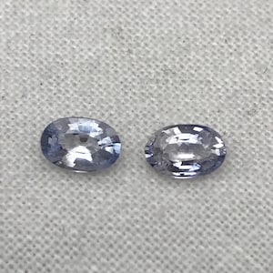 2 Natural Blue Sapphires 0.79 carats total, Loose Faceted Pair of Light Blue Sapphires, Oval Cut, 5.4x3.55mm Matching