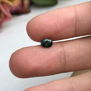 0.67 carat Natural Green Sapphire Oval Approx. 5x4.5mm image 3