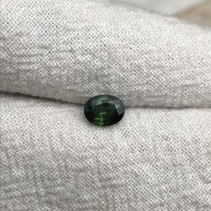0.67 carat Natural Green Sapphire Oval Approx. 5x4.5mm image 9
