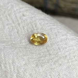 Natural Yellow Sapphire 0.67 Carat 5.8x4.1mm Oval Cut, Beryllium Treated Sapphire, Faceted Loose Gemstone, BE Treated image 1