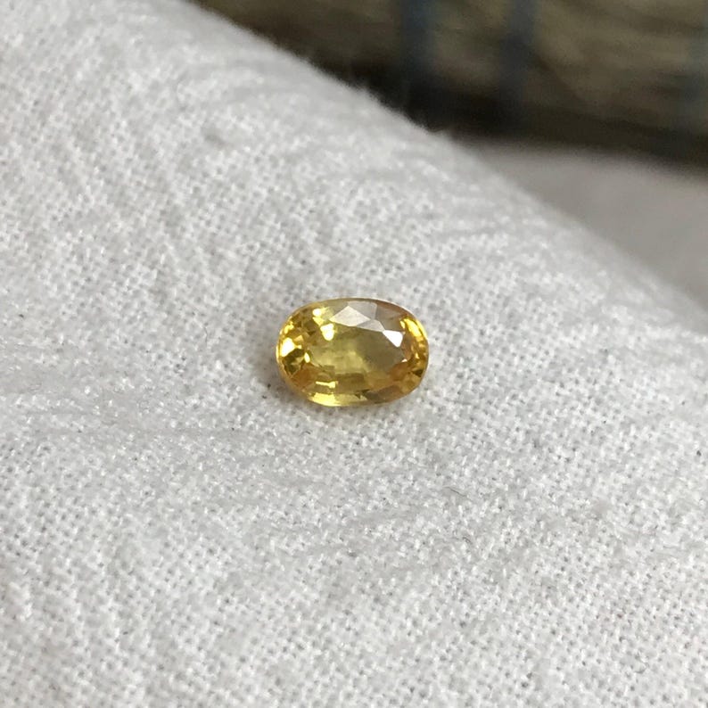Natural Yellow Sapphire 0.67 Carat 5.8x4.1mm Oval Cut, Beryllium Treated Sapphire, Faceted Loose Gemstone, BE Treated image 1