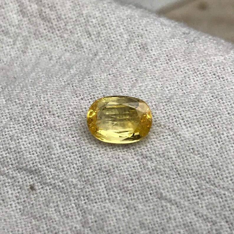Naturlig gul safir 1,34 karat 7,5x5,5 mm oval slipning, färgbehandlad ädelsten, jordbrytning, BE-värme bild 9