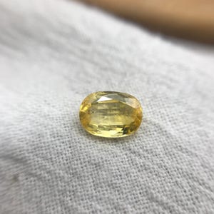 Naturlig gul safir 1,34 karat 7,5x5,5 mm oval slipning, färgbehandlad ädelsten, jordbrytning, BE-värme bild 5