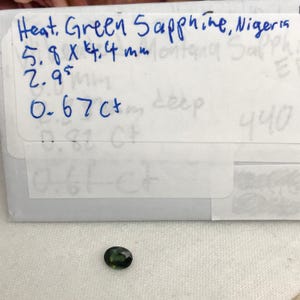 0.67 carat Natural Green Sapphire Oval Approx. 5x4.5mm image 10