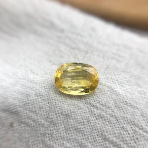 Naturlig gul safir 1,34 karat 7,5x5,5 mm oval slipning, färgbehandlad ädelsten, jordbrytning, BE-värme bild 7