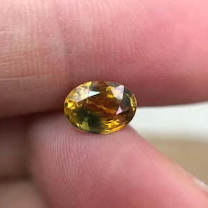 1.51 Karat Erhitzter Gelb Orange Saphir 7.91x5.82mm Oval Cut, Facettierter Loser Edelstein, Australischer Saphir