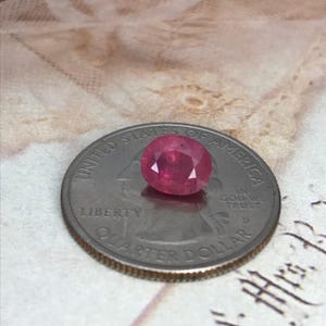 1.97 Carat Natural Pink Sapphire Heated with Residues 7.7x 6.5mm Oval Ruby or Fancy Color Sapphire