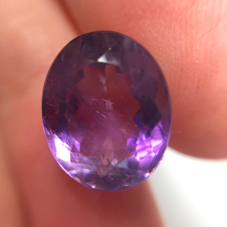 6,51 karat lila ametist 12,5 x 10 mm oval slipning, lös fasetterad födelsesten bild 5