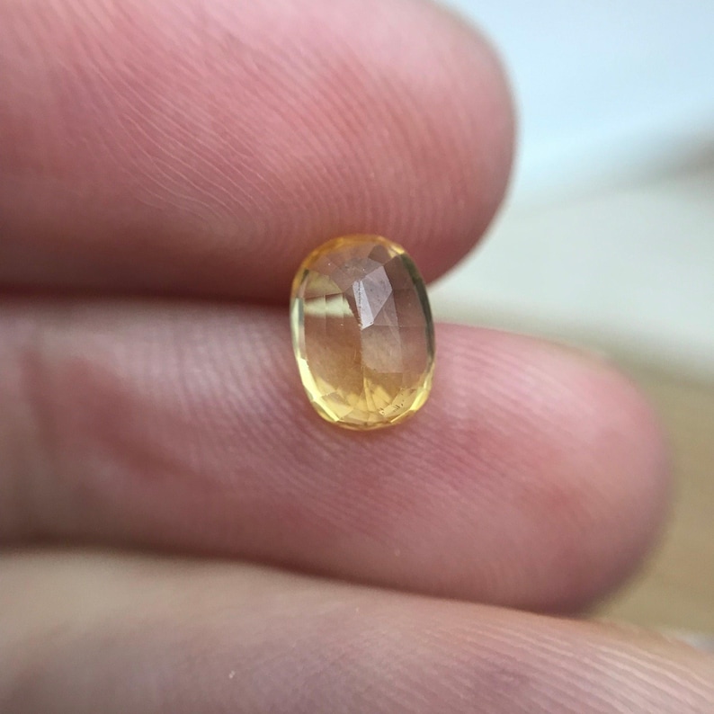 Naturlig gul safir 1,34 karat 7,5x5,5 mm oval slipning, färgbehandlad ädelsten, jordbrytning, BE-värme bild 6