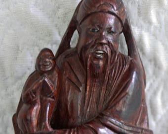 Antique Chinese Rosewood Carved Figure Man holding baby