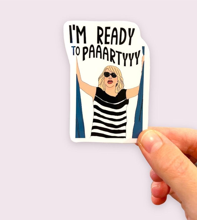 May include: A sticker featuring a cartoon illustration of a woman with blonde hair wearing sunglasses and a striped shirt. The woman is holding up blue curtains with the text "I'm ready to paaartyyy!" printed above her.