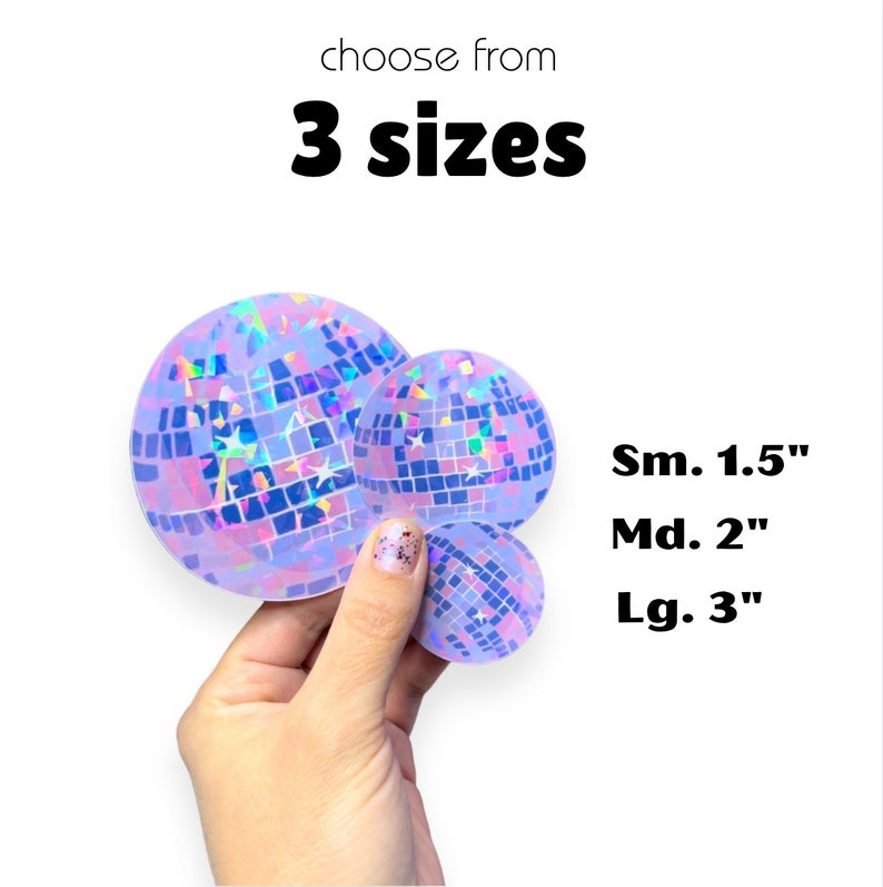 May include: Three iridescent holographic disco ball stickers in different sizes: 1.5 inches, 2 inches, and 3 inches.  The stickers are purple and blue with a glittery finish.
