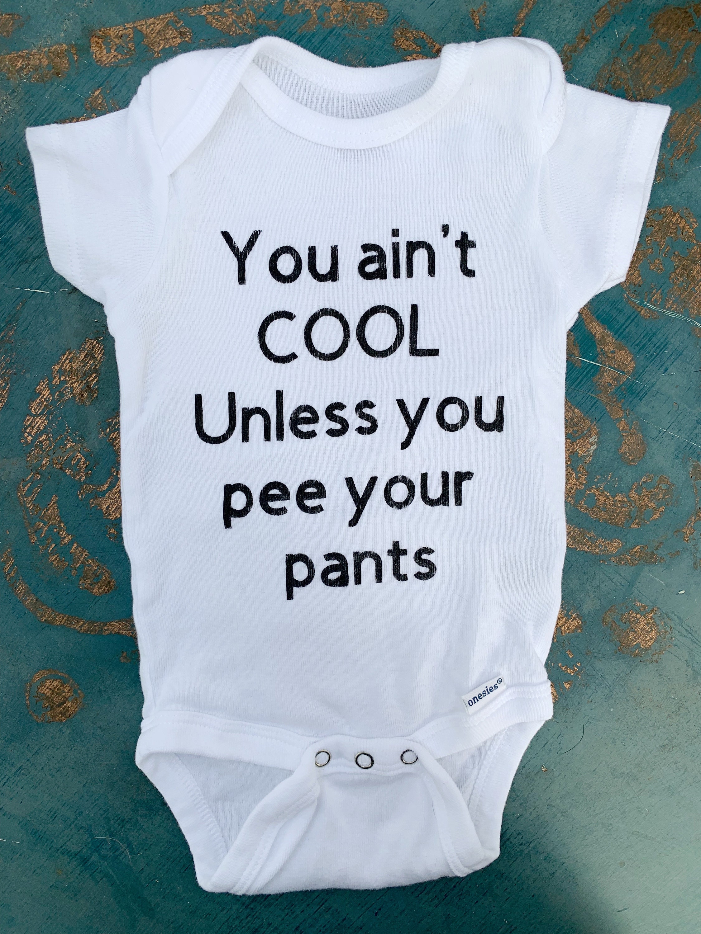 Details about   You Ain't Cool Unless You Pee Your Pants Funny Baby Bodysuit 