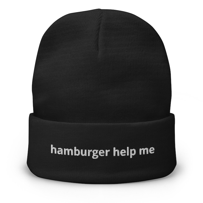May include: Black beanie with the text "hamburger help me" embroidered in white.