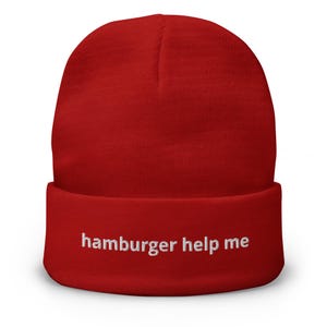 May include: Red beanie with the text "hamburger help me" embroidered in white on the cuff.