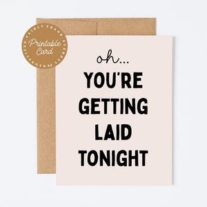 May include: A greeting card with the text "oh... YOU'RE GETTING LAID TONIGHT" in black font on a light pink background. The card is paired with a brown envelope and a round sticker that says "Printable Card".