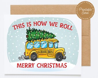 May include: A Christmas card featuring a yellow school bus with a Christmas tree on top. The text "This is how we roll" and "Merry Christmas" is written on the card.