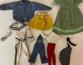 Vintage doll clothes not tagged #1540. various sized clothes.