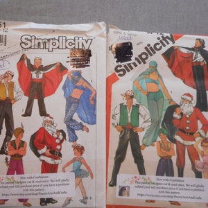 May include: Two Simplicity sewing pattern envelopes. The left envelope is for sizes 10-12 and features a variety of costumes including a pirate, a vampire, a genie, and Santa Claus. The right envelope is for boys and girls sizes 4-12 and features costumes including a pirate, a genie, a ballerina, and Santa Claus. Both envelopes have the text "Simplicity" printed on the front.