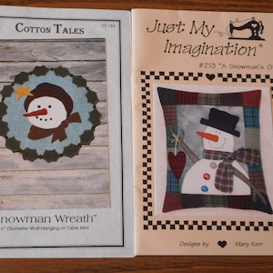 May include: Two craft patterns for making snowman decorations. The first pattern is for a 16-inch diameter snowman wreath wall hanging or table mat. The second pattern is for a pillow with a snowman design and the text "A Snowman's Gift".
