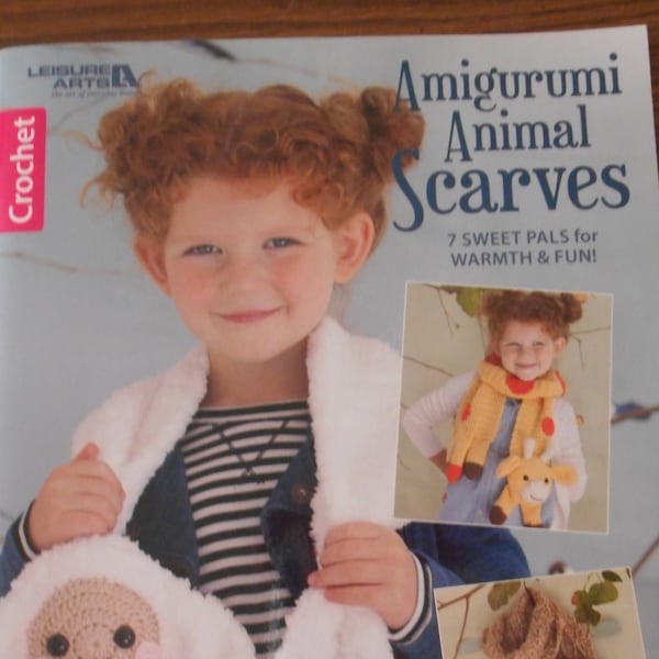 Amigurumi Animal Scarves. Seven Sweet Pals for warmth and fun. Softcover book by Ida Herter.  Like new.