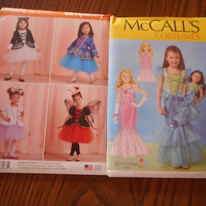 May include: Two sewing pattern packages for children's costumes. The package on the left is Simplicity pattern 63978 and features four different costumes: a butterfly, a ballerina, a cat, and a princess. The package on the right is McCall's pattern M7175 and features two mermaid costumes, one for a child and one for a doll.