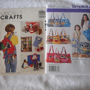 May include: Two sewing patterns for bags. The first pattern is from McCall's Crafts and shows a child wearing a red backpack with various stuffed animals attached. The second pattern is from Simplicity and shows three different owl-themed bags with colourful fabrics.