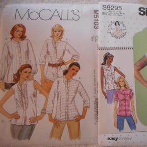 May include: A sewing pattern booklet with images of women wearing different blouses. The booklet is titled "McCall's M5103" and "Simplicity S9295 easy-to-sew".