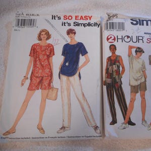 May include: A sewing pattern for separates, featuring four different outfits. The pattern is from Simplicity and is for a two-hour project. The pattern includes a floral print top and shorts, a blue top and pants, a white top and shorts, and a white top and pants with a tie.