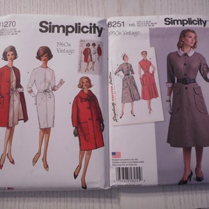 May include: Simplicity sewing patterns for vintage dresses. The patterns include a red coat, a white dress, a red dress, and a brown dress. The patterns are labeled with the numbers R11270 and 8251.