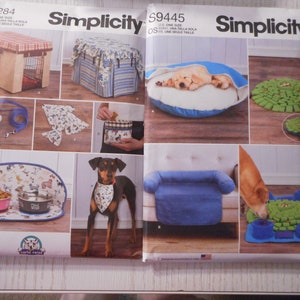 May include: Simplicity sewing patterns for dog accessories. The image shows patterns for dog beds, crate covers, bandanas, placemats, and treat containers. The patterns feature various designs and styles, including a dog bed with a sleeping puppy.