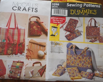 May include: Two sewing pattern packages, one from McCall's Crafts and one from Simplicity for Dummies. The McCall's package shows a tote bag and several smaller bags with red and white plaid fabric. The Simplicity package shows a tote bag and several smaller bags with a floral pattern. Both packages feature the text "Stitch up a storm the Fun and Easy Way".