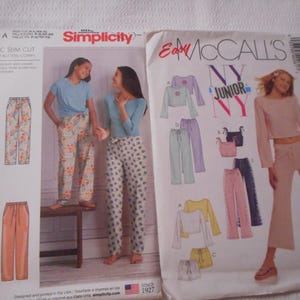 May include: Two sewing pattern packets for making trousers and tops. The Simplicity pattern is for a classic slim cut with a choice of two different patterns. The McCall's pattern is for a junior size top and trousers with a cropped top and wide-leg trousers.