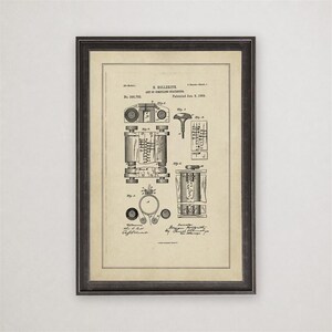May include: A framed patent print titled H. Hollerith Art of Compiling Statistics, dated January 8, 1889. The document features technical black line drawings of mechanical components labeled Fig 1 through Fig 6 on a beige background with a dark frame.