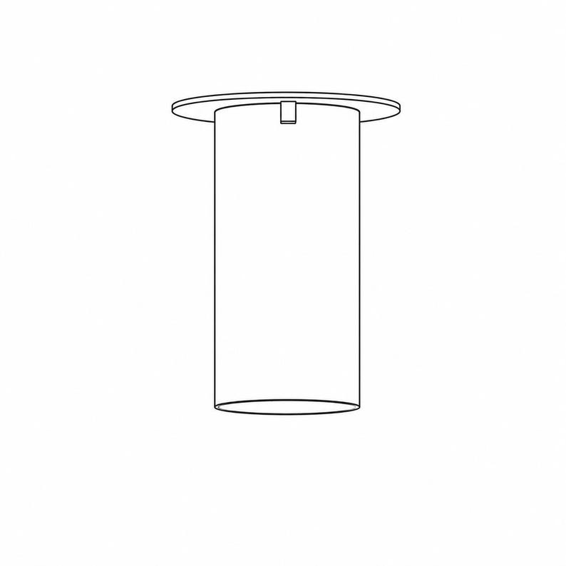 May include: A black and white line drawing of a cylindrical light fixture. The design features a flat circular top plate with a small rectangular connector attached to the side, leading down into a long, hollow, vertical tube structure.