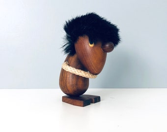 Teak figure in the style of The Pessimist by Hans Bolling
