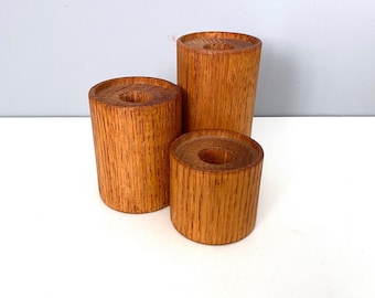 Teak type candlesticks made in Denmark - three different heights